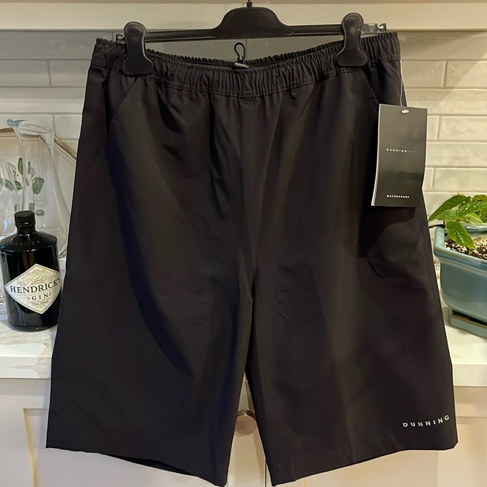 NWT Mens black waterproof Dunning Golf shorts.